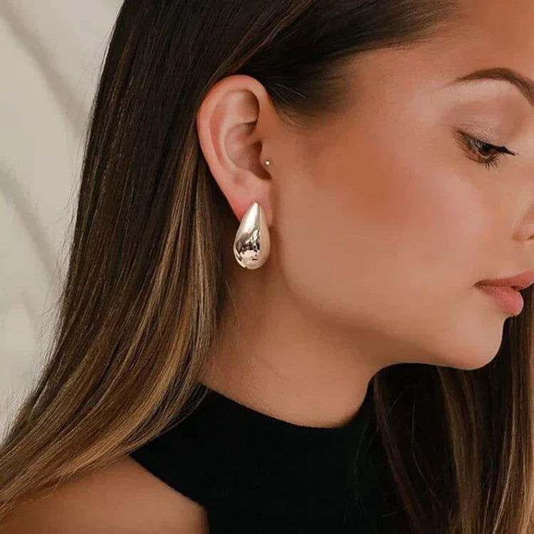 ShineDrop™ Feminine Statement Glow